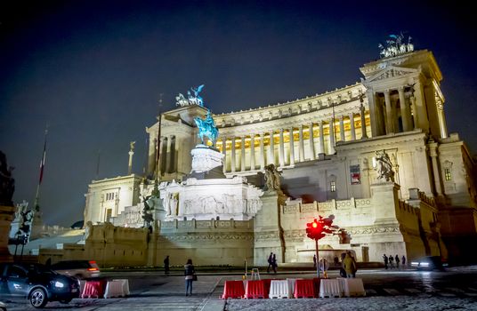 The National Monument to Victor Emmanuel II King of Italy shot at night in Rome, Italy