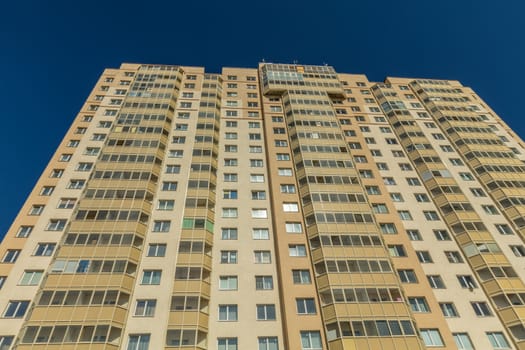 Modern building exterior low angle view with blue sky