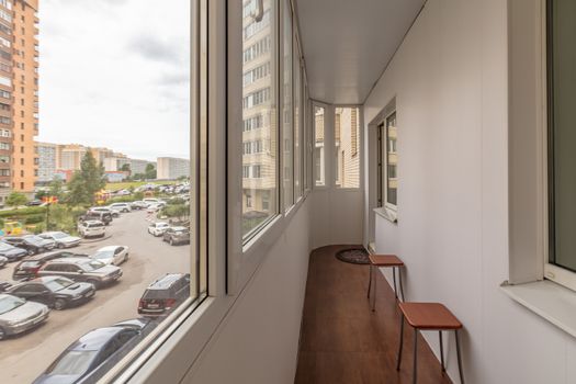 Small balcony interior in modern apartment building