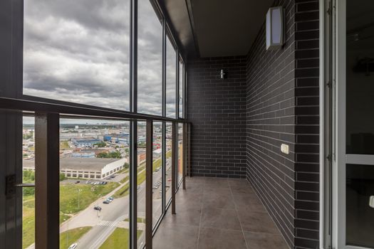 Small balcony interior in modern apartment building