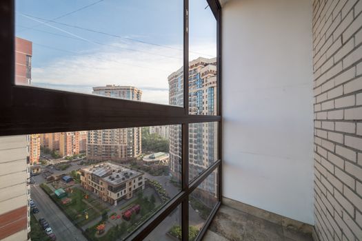 Small balcony interior in modern apartment building