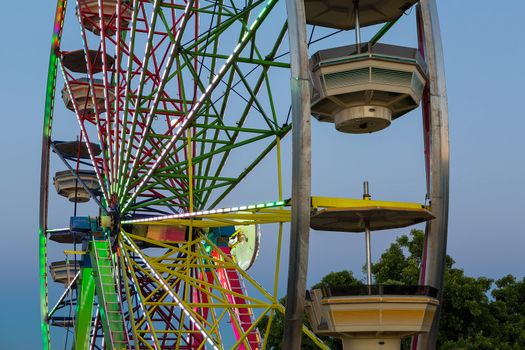 Ferris Wheel in Fun Fair during PortlandRose Festival at evening twilight hour