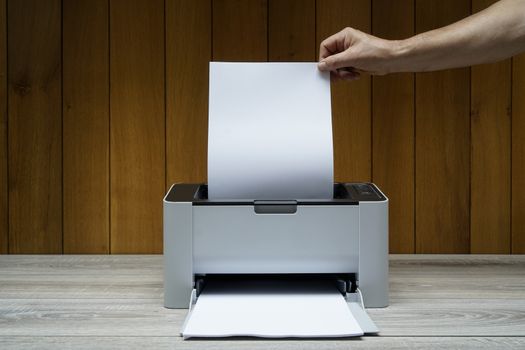a sheet as it exits the printer