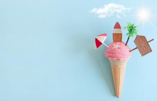 Strawberry icecream with beach items below sun 