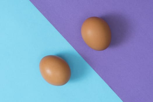 two eggs on a two-color surface