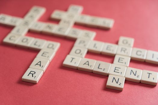 playing scrabble on a red table