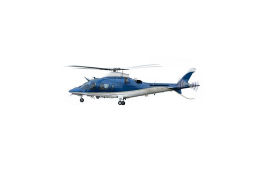 White and blue helicopter in flight, before landing with landing gear down, isolated on white