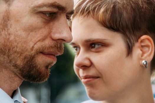 Portrait of young couple face to face. Shallow ddepth of field