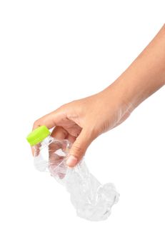 Close up hand throwing empty plastic bottle into the trash isolated on white background, Save clipping path. Recycling Concept