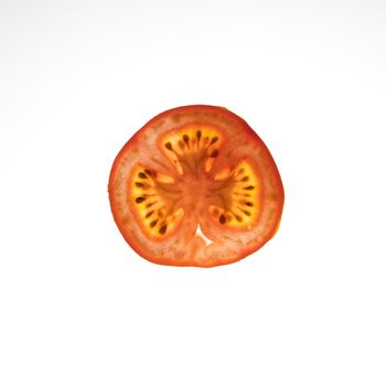 tomato slice lit from the back