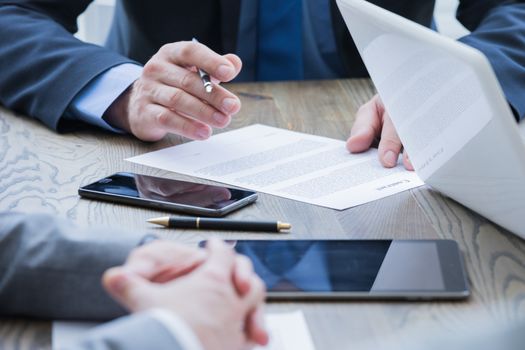 Business man sign contract on the desk at meeting