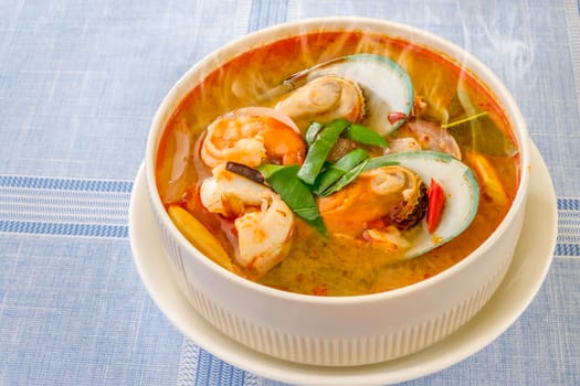 Spicy seafood soup or Tom Yum goong , Traditional food in Thailand