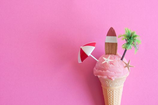Strawberry icecream with parasol, surfboard and pine tree