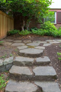 Steeping Stone Steps and Path to house fenced backyard garden