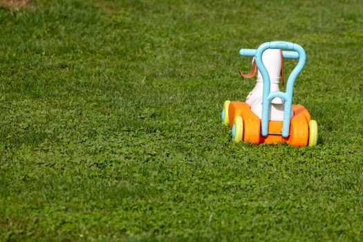 Toy truck on grass, abandoned toy, childs play