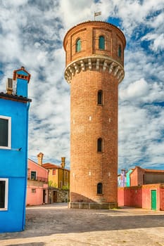 Water tower on the island of Burano, Venice, Italy. The island is a popular attraction for tourists due to its picturesque architecture