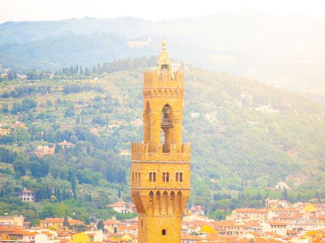 Detailed view of tower of Town Hall Palazzo Vecchio, or Palazzo della Signoria, Florence, Italy.