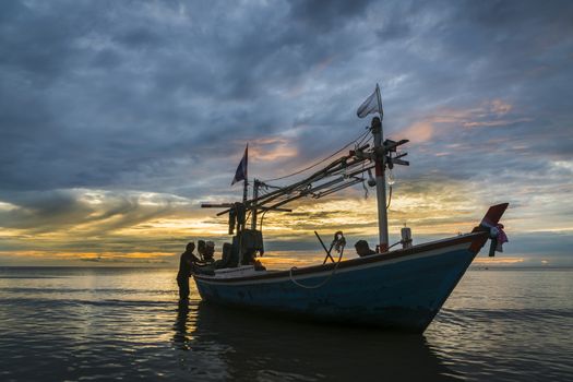 Tropical fishing boat in dawn.