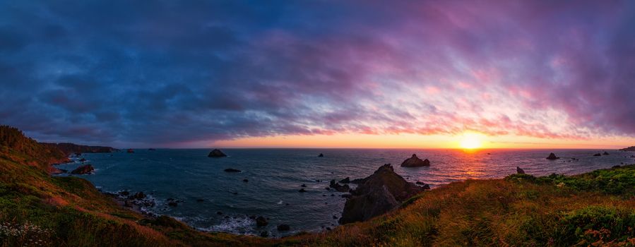 Panoramic color image. Rocky Beach Landscape at Sunset