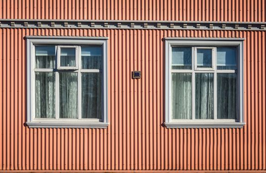 Rustic, Brightly Colored Pink Home In Reykjavik Iceland