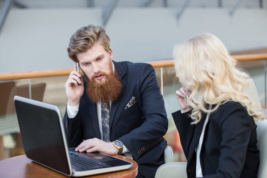 business couple working together on project at modern office