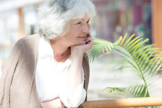 Portrait of nice smilig thoughtful senior woman close up