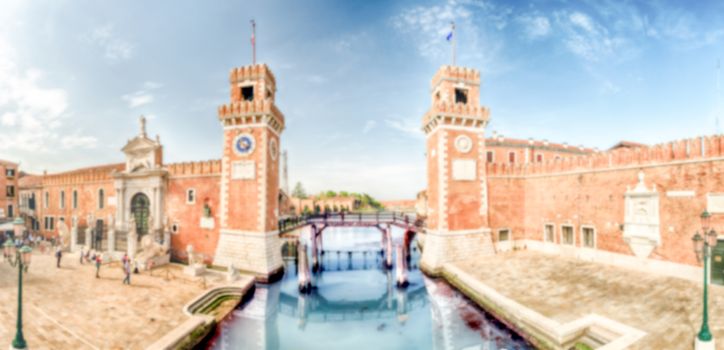 Defocused background with entrance to the Venetian Arsenal, Venice, Italy. Intentionally blurred for bokeh effect