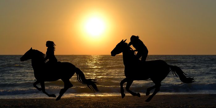 Two horse riders silhouettes galloping on the beach