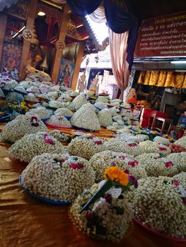 a lot of Jasmine garland flowers for play Buddha statue in Temple at the North of Thailand  at Wat Phra That Doi Kham (Temple of the Golden Mountain) Chiang Mai