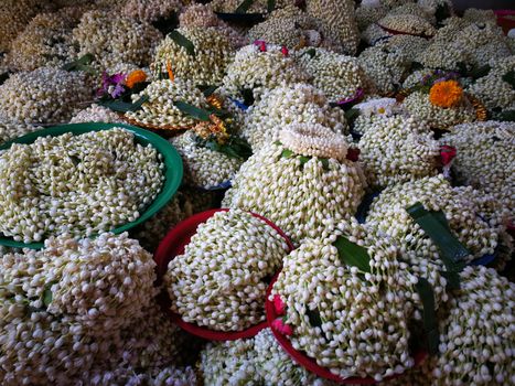 a lot of Jasmine garland flowers for play Buddha statue in Temple at the North of Thailand  at Wat Phra That Doi Kham (Temple of the Golden Mountain) Chiang Mai