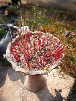 incense and candles  for Buddha statue to pray gods in Thailand Temples