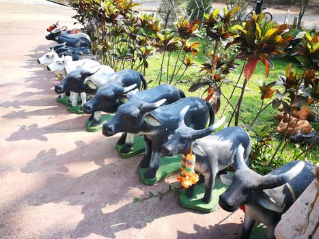 Thailand animals of ceramic dolls  for Buddha statue and Thailand text were words to pray god