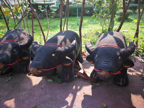 Thailand animals of ceramic dolls  for Buddha statue and Thailand text were words to pray god