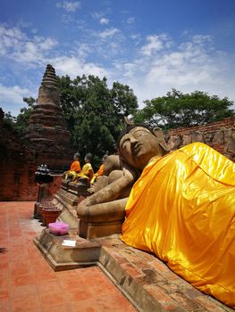 Thailand text mean Warning travelers Do not climb .The bigger Reclining Buddha in Thailand Temples at "Ayutthaya" Province that Historical Attractions.

