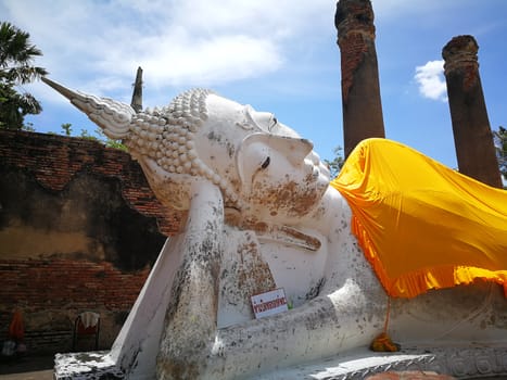 Thailand text mean Warning travelers Do not climb .The bigger Reclining Buddha in Thailand Temples at "Ayutthaya" Province that Historical Attractions.

