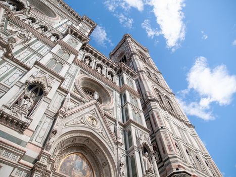 Main portal of Florence Catherdal, Cattedrale di Santa Maria del Fiore or Il Duomo di Firenze, with ornamental mosaic, Firenze, Tuscany, Italy.