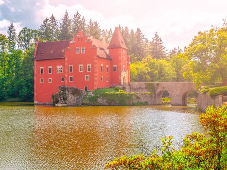 Renaissance chateau Cervena Lhota in Southern Bohemia, Czech Republic. Idyllic and picturesque fairy tale castle on the small island reflected in the romantic lake.