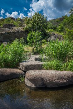 Granite Arbuzinka Rocks in the canyon near the Aktovo village, on the Mertvovod river in Ukraine. One of natural wonders of Europe.