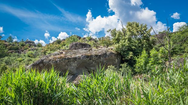 Granite Arbuzinka Rocks in the canyon near the Aktovo village, on the Mertvovod river in Ukraine. One of natural wonders of Europe.