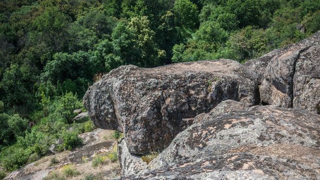 Granite Arbuzinka Rocks in the canyon near the Aktovo village, on the Mertvovod river in Ukraine. One of natural wonders of Europe.