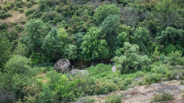 Granite Arbuzinka Rocks in the canyon near the Aktovo village, on the Mertvovod river in Ukraine. One of natural wonders of Europe.