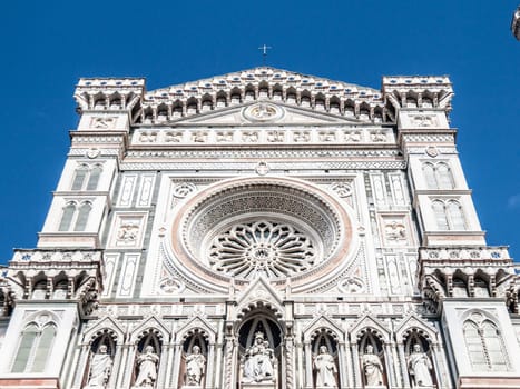 Main portal of Florence Catherdal, Cattedrale di Santa Maria del Fiore or Il Duomo di Firenze, with ornamental mosaic, Firenze, Tuscany, Italy.