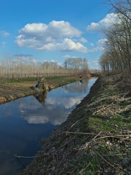 Irrigation canal during early spring, landscape view