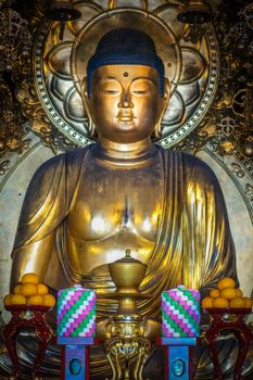 Golden Buddha inside Chion-In Temple, Kyoto, Japan