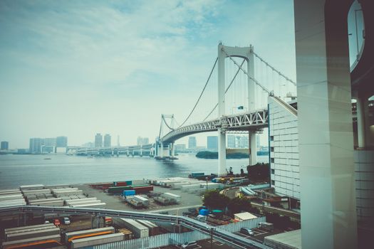 Rainbow bridge and cityscape in Tokyo, Japan