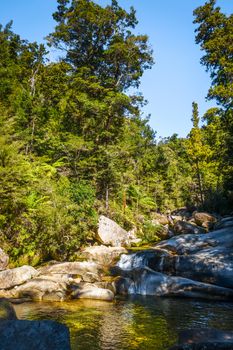 Cleopatra pools waterslide in Abel Tasman National Park, New Zealand