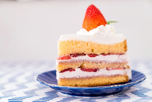 slice Strawberry Cake top with fresh strawberry