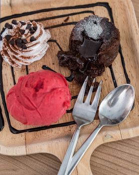 chocolate lava cake with ice cream and chocolate sauce