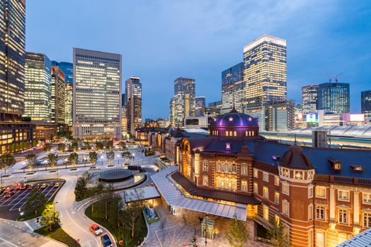 Landscape of Tokyo Station at dusk with building skyline