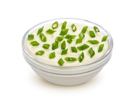 Sour cream and green onion isolated on white background with clipping path